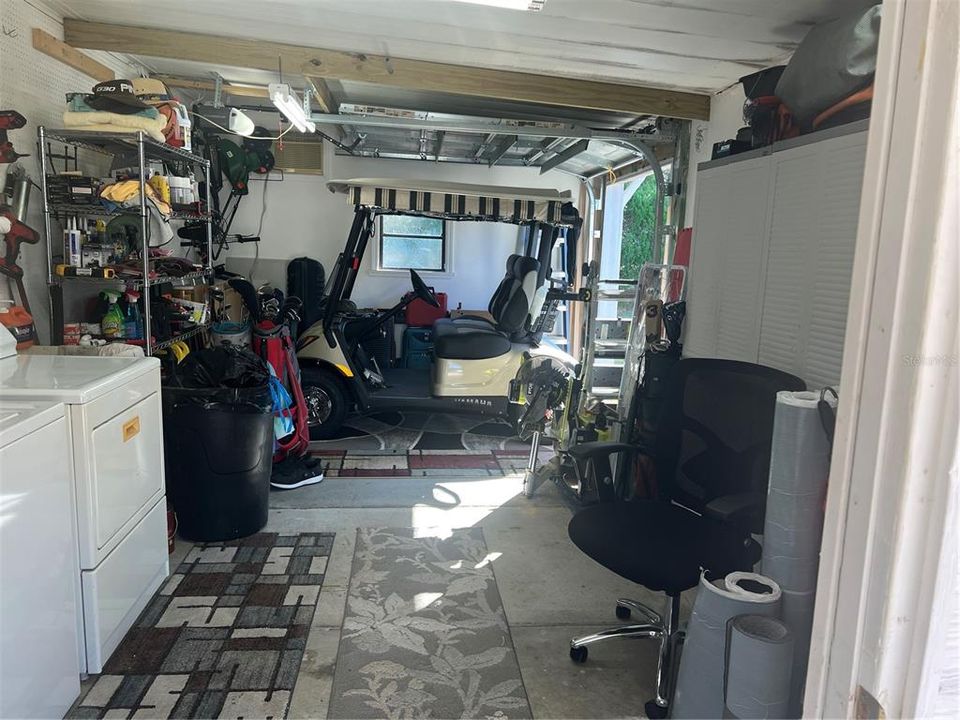 Laundry storage in Golf Cart garage