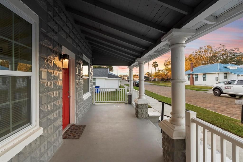 Front Porch – Welcoming covered porch at the entrance.