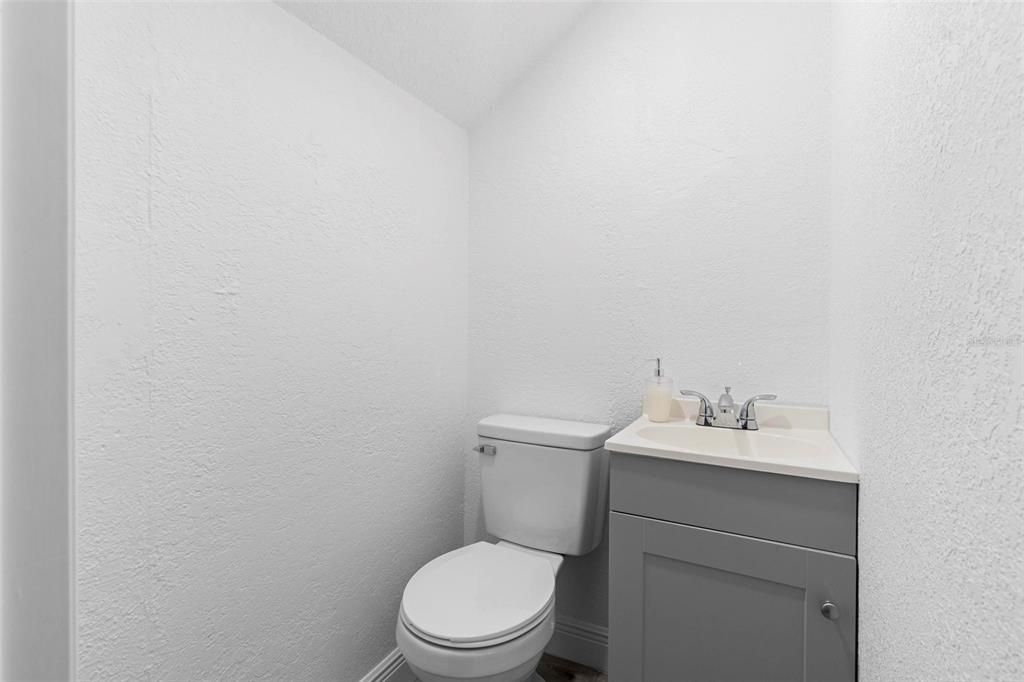 Half Bathroom - Second Floor – Convenient half bath with sink and toilet on the second floor.