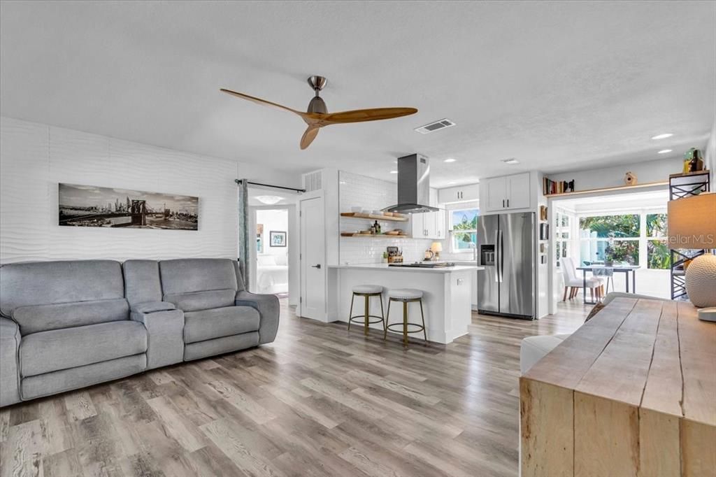 Open floor plan and kitchen with counter that seats up to 6