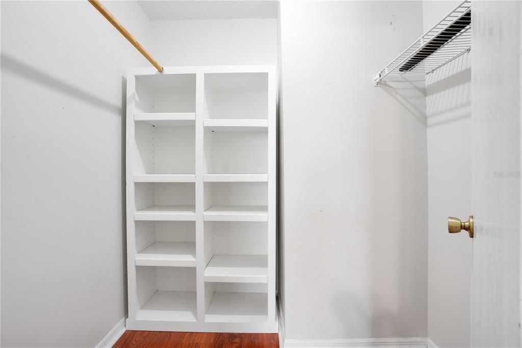 Primary walk-in closet with built-in's