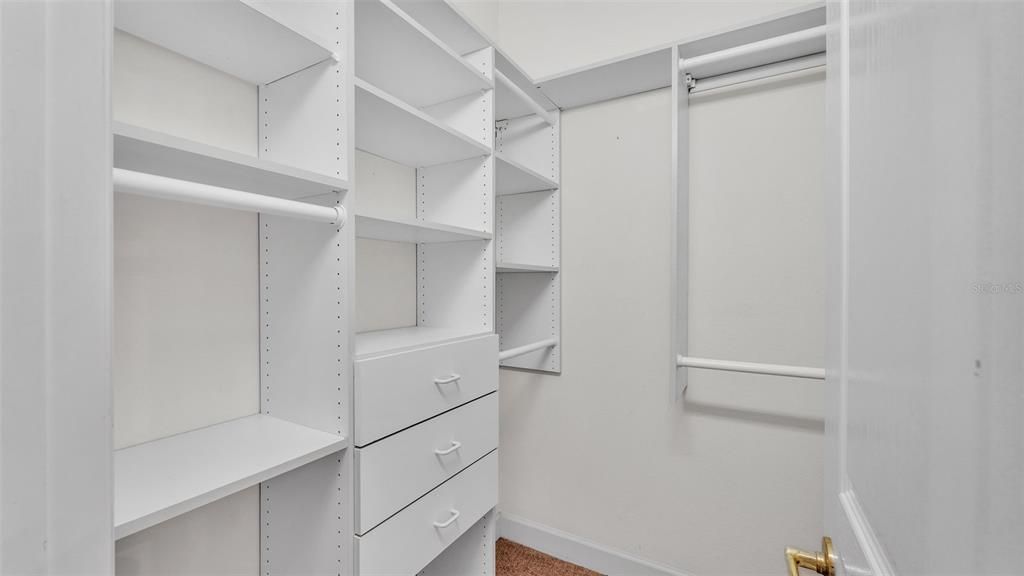 Dual walk-in primary closets