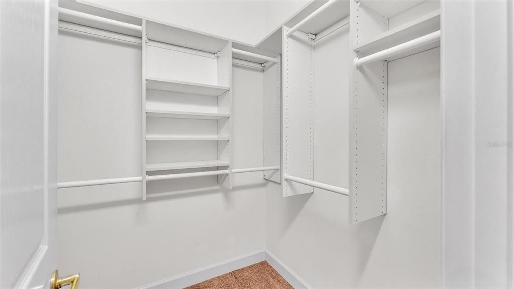 Dual walk-in primary closets