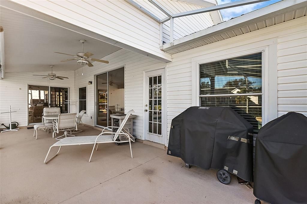 Covered Lanai open to Screened Pool Enclosure