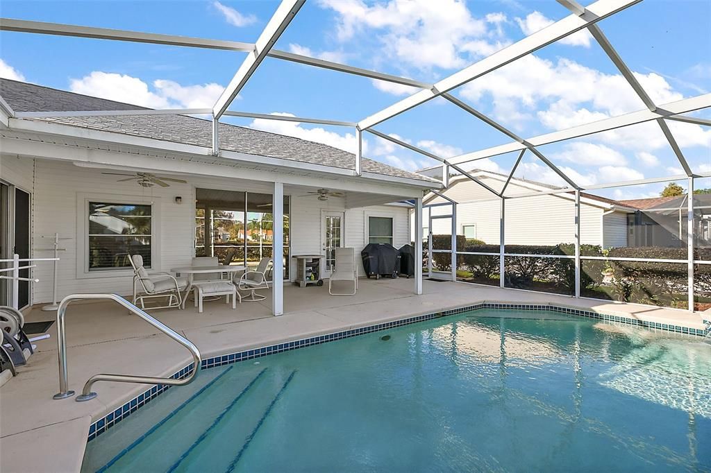 Covered Lanai open to Screened Pool Enclosure