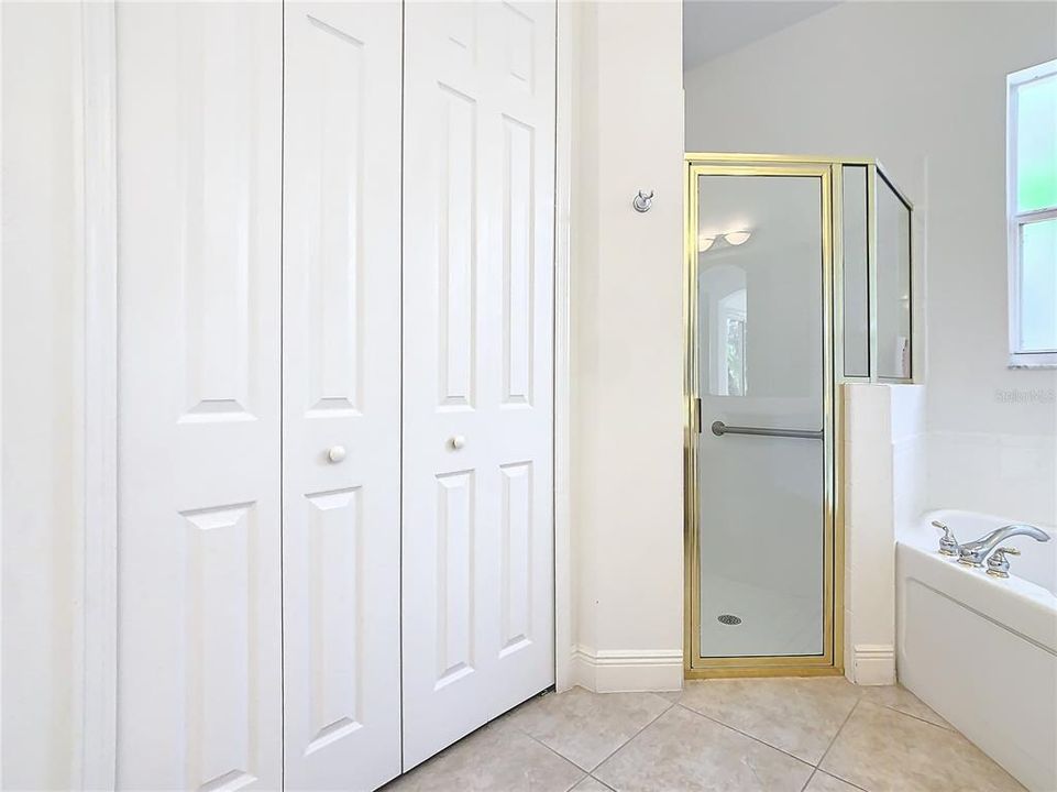 Walk In Shower & Linen Closet on Left