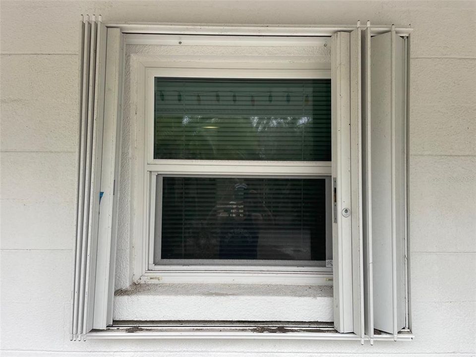 HURRICANE SHUTTERS AND HEAVY WINDOWS