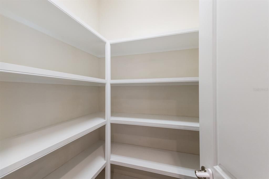 PANTRY WITH SOLID SHELVING