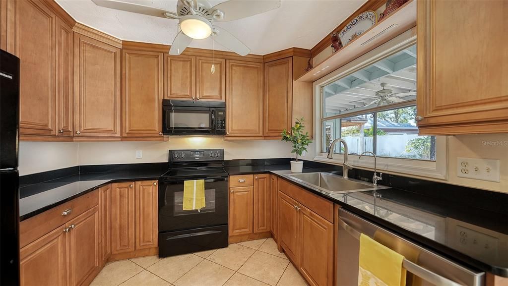 Wood Cabinets, Stone Countertops