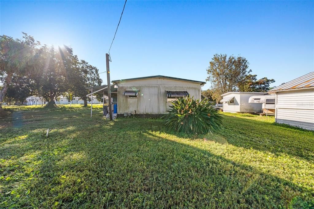 Collapsed carport virtually removed to show property