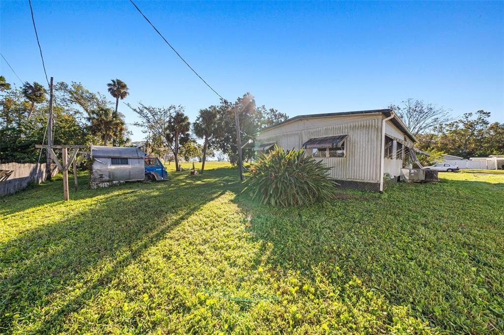 Carport collapsed during Hurricane Milton and virtually removed from this photo to show the property better.