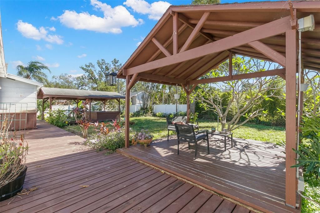 Huge backyard with deck and shade