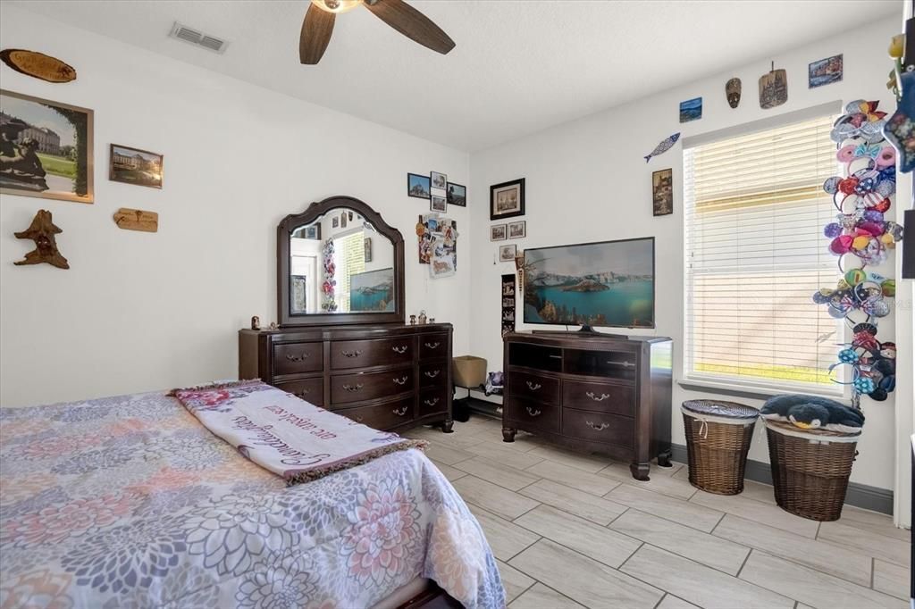 Second bedroom with tile flooring