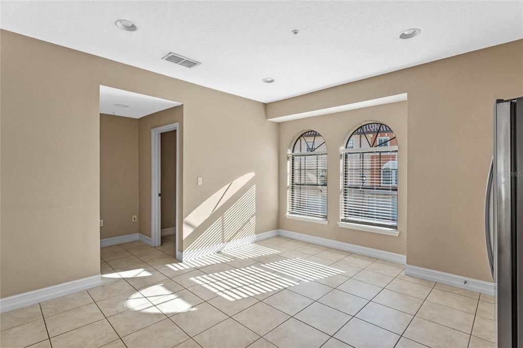 Kitchen eating area with large windows