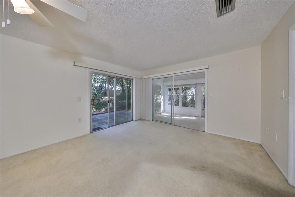 7. Living Room with sliders to the patio and Florida Room