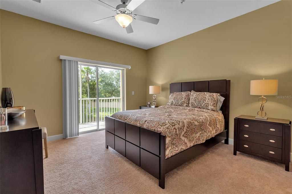 Primary Bedroom with sliding doors to balcony