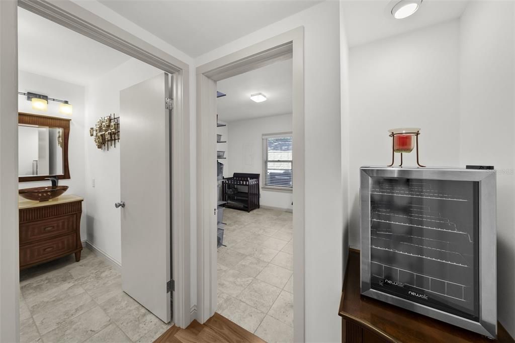 Laundry room and secondary bathroom on first floor