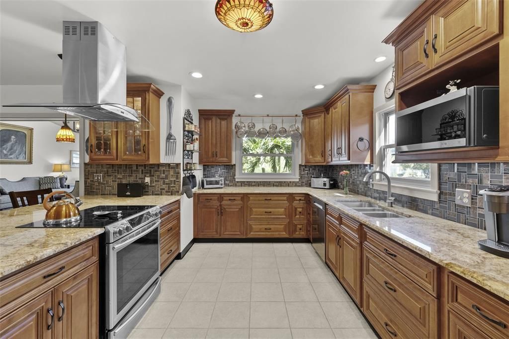 Custom kitchen with granite counters, great for entertaining