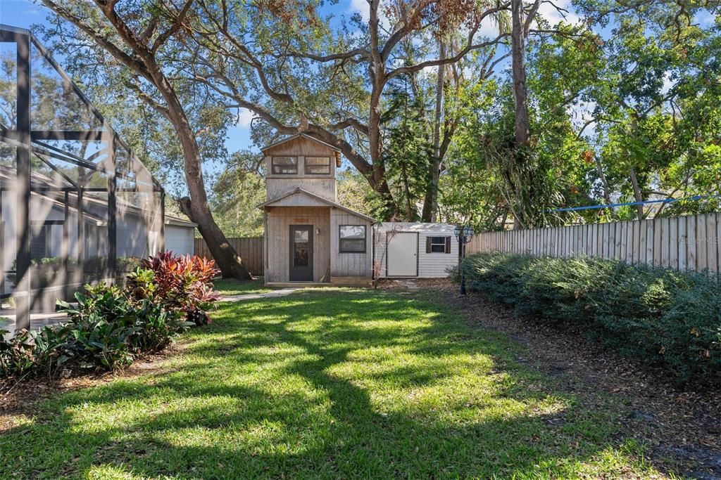 Custom built  two story clubhouse with AC and half bath