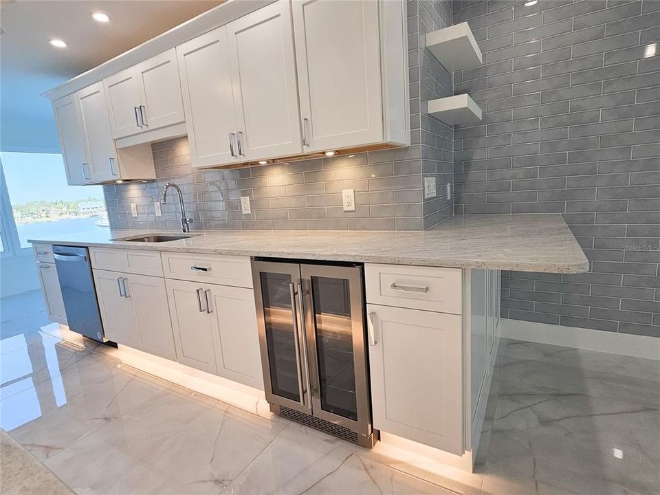 Kitchen Area w/ Built in Wine Cooler.