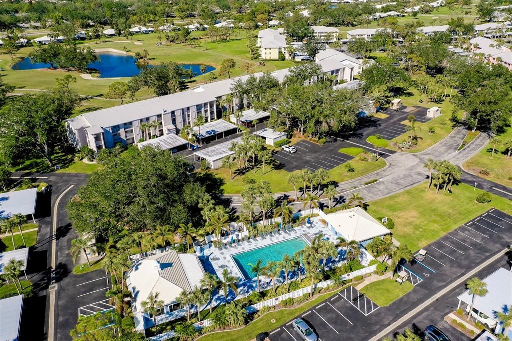 Aerial view showing proximity of pool and clubhouse.