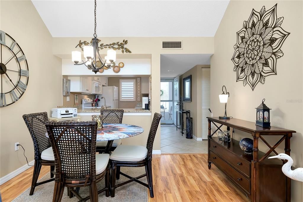 Wood look laminate floors in the dining and living areas.