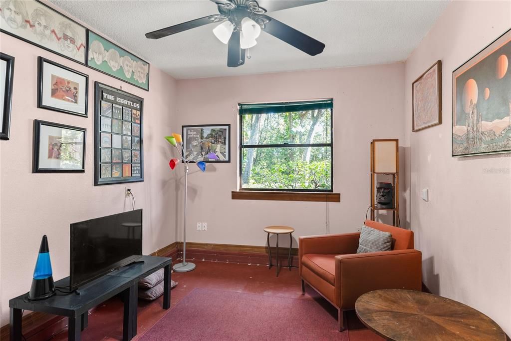 This bonus room near the garage and laundry room offers flexible space and could easily be transformed into a mudroom or hobby area.