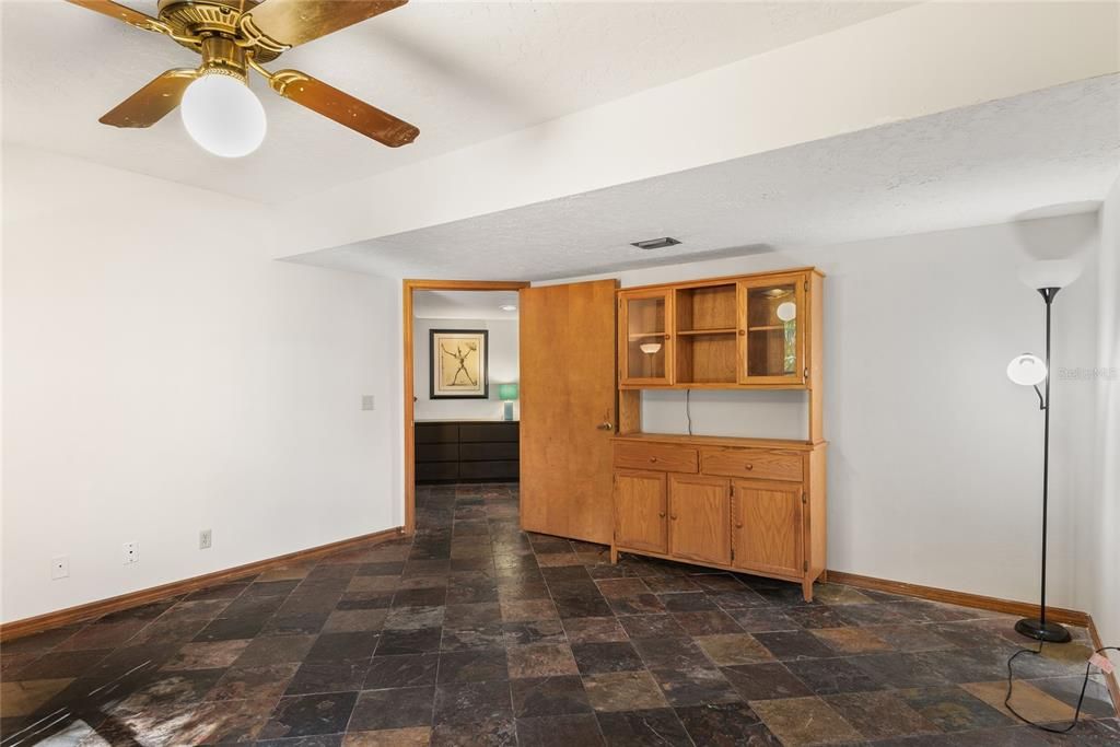 Bedroom 2-(Downstairs)This flexible space offers endless possibilities! Imagine it as a home office, playroom, or guest suite.