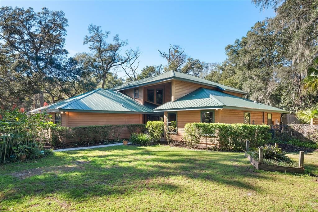 Welcome to your private oasis! This charming home is nestled on a sprawling, wooded lot, offering peace and tranquility.