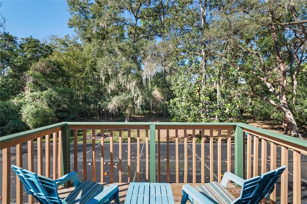 Balcony off Bedroom 3 - Enjoy your morning coffee or evening sunsets on this private balcony, overlooking the lush backyard.