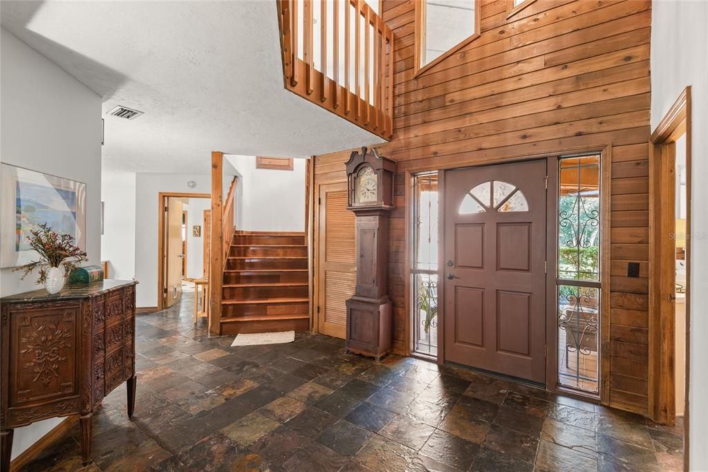 Step inside to a grand entrance! Soaring ceilings and a beautiful staircase create a welcoming first impression.