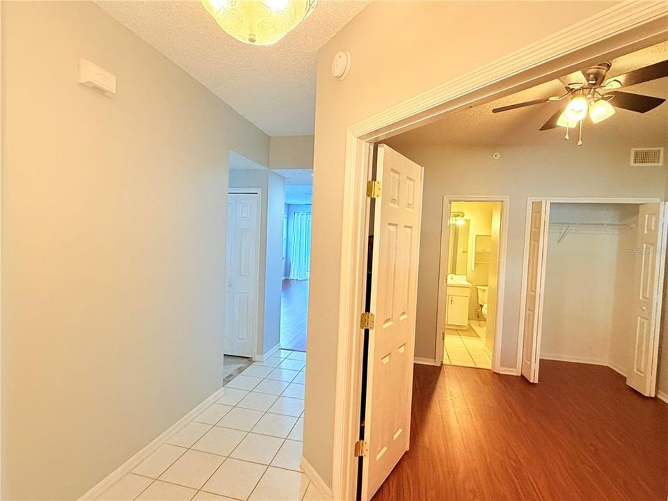 VIEW UPON ENTERING, DOUBE DOORS LEAD TO THE 2ND BEDROOM WITH PRIVATE ACCESS TO 2ND BATHROOM