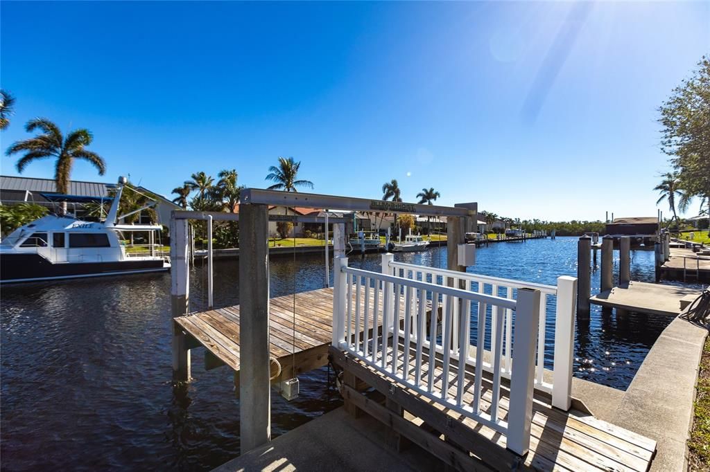 The 85 ft. of water frontage includes a city-maintained seawall, and two concrete docks, complete with water and electric hookups, making this home a boater’s dream.