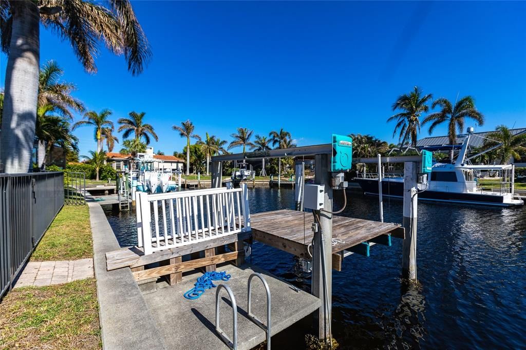 The 85 ft. of water frontage includes a city-maintained seawall, and two concrete docks, complete with water and electric hookups, making this home a boater’s dream.