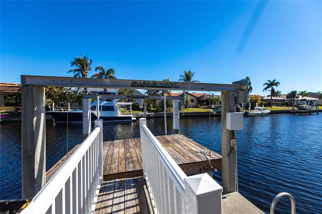 The 85 ft. of water frontage includes a city-maintained seawall, and two concrete docks, complete with water and electric hookups, making this home a boater’s dream.