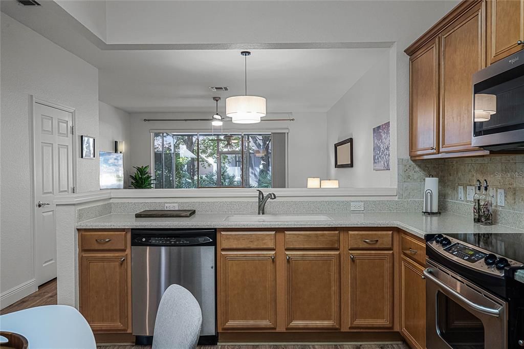 Kitchen overlooks the dining area and living room