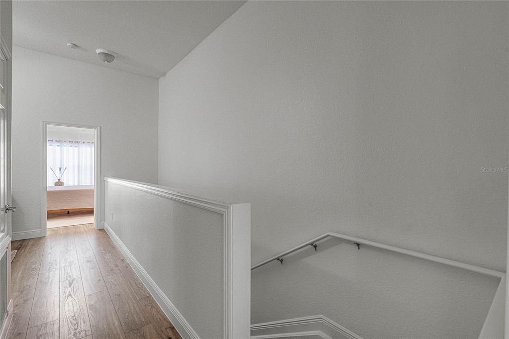 Laminate floors continue throughout the second floor