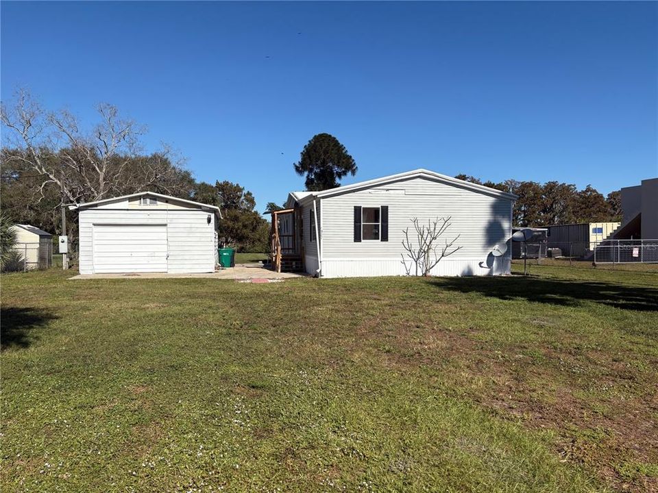 FRONT WITH FENCED YARD