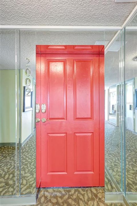 What's behind the red door?  The Pinnacle Penthouse!