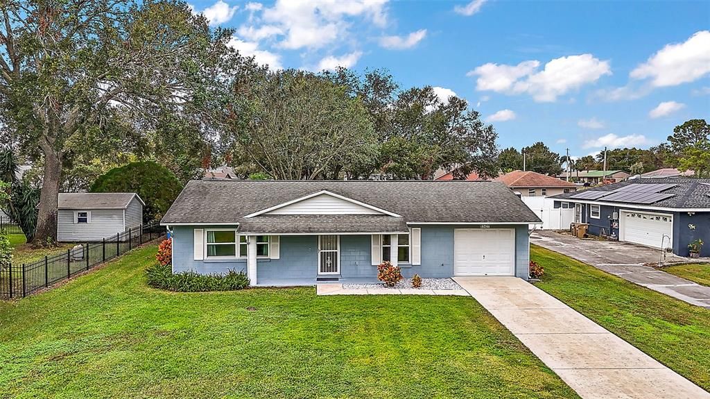 Exterior Front with Extra Long Driveway