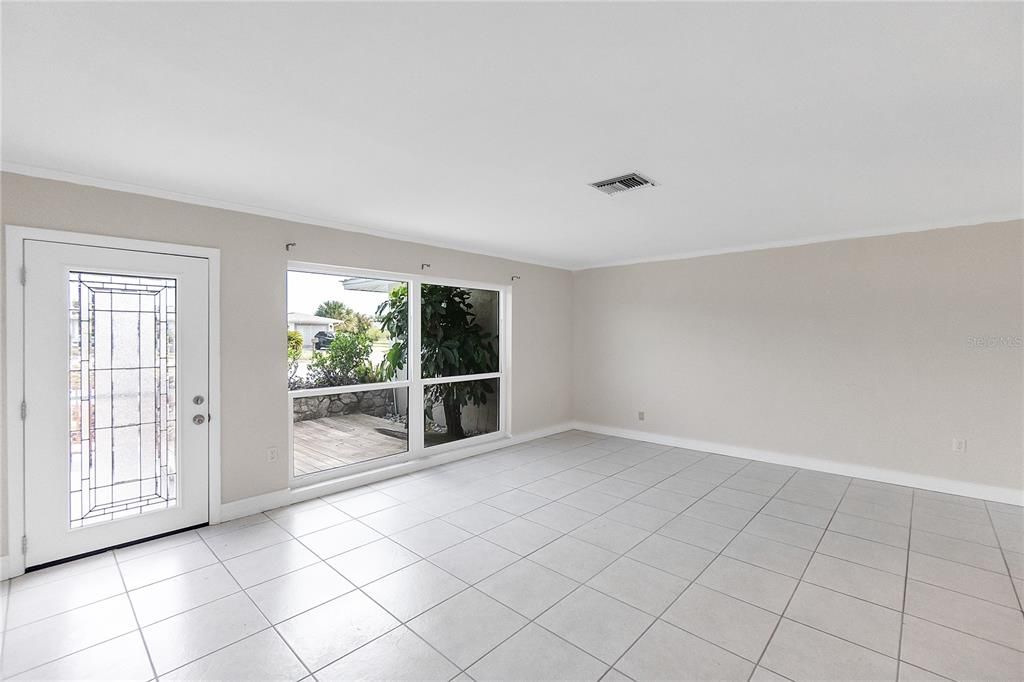 FRONT ENTRANCE AND MAIN LIVING AREA