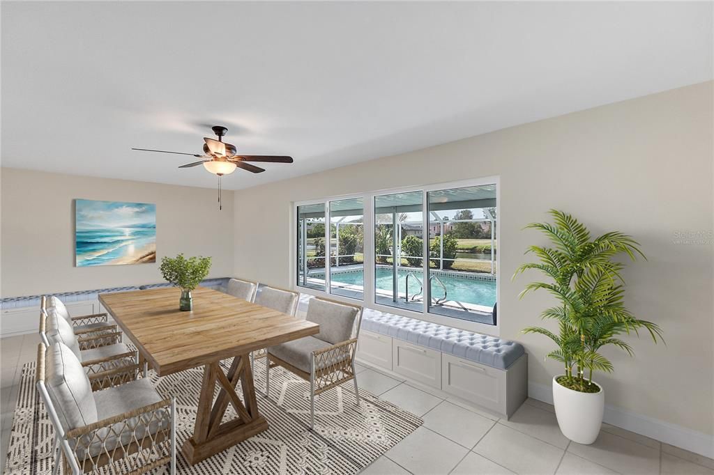 VIRTUALLY STAGED  FAMILY ROOM OVERLOOKING THE POOL