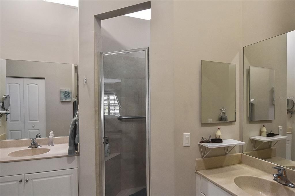 Primary Bathroom with divided double sinks