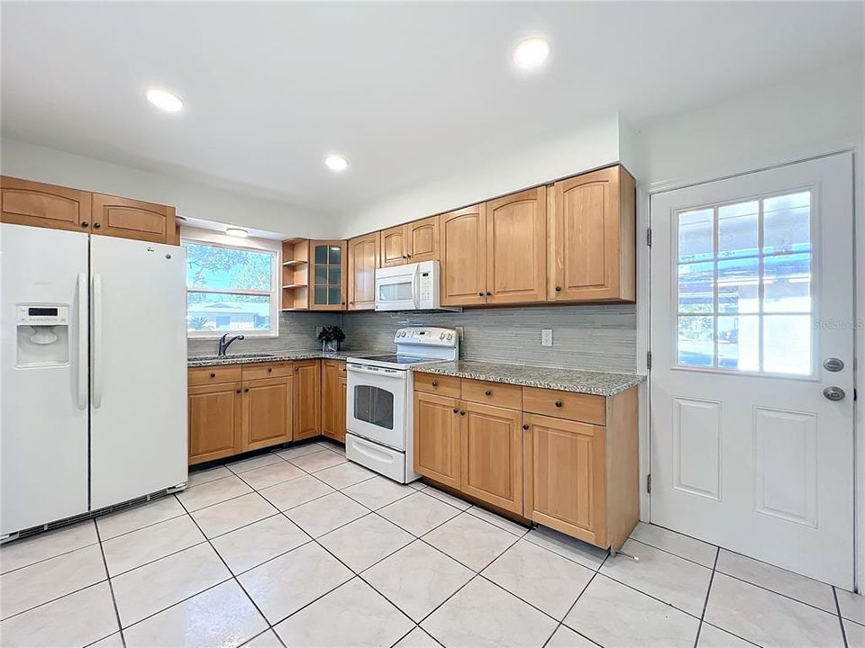 Kitchen is large enough for a table and chairs