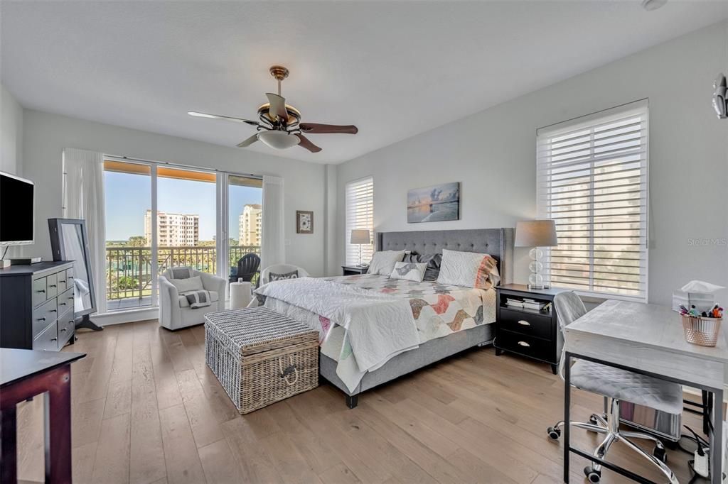 Oversized primary bedroom with large balcony.