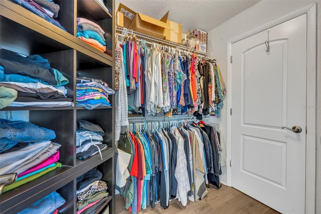 Primary walk-in closet.