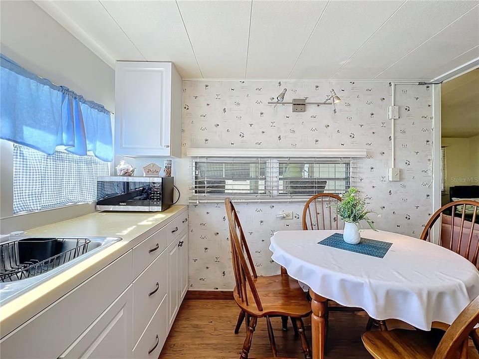 Kitchen with eat in dining area.