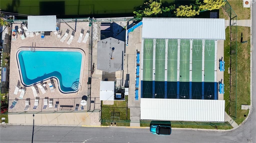 Aerial view of the pool and shuffleboards courts.