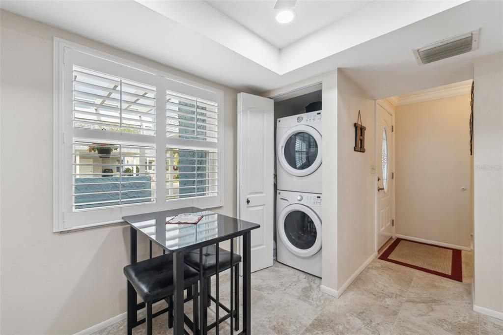 Stacked Washer and Dryer convey with the sale of the home