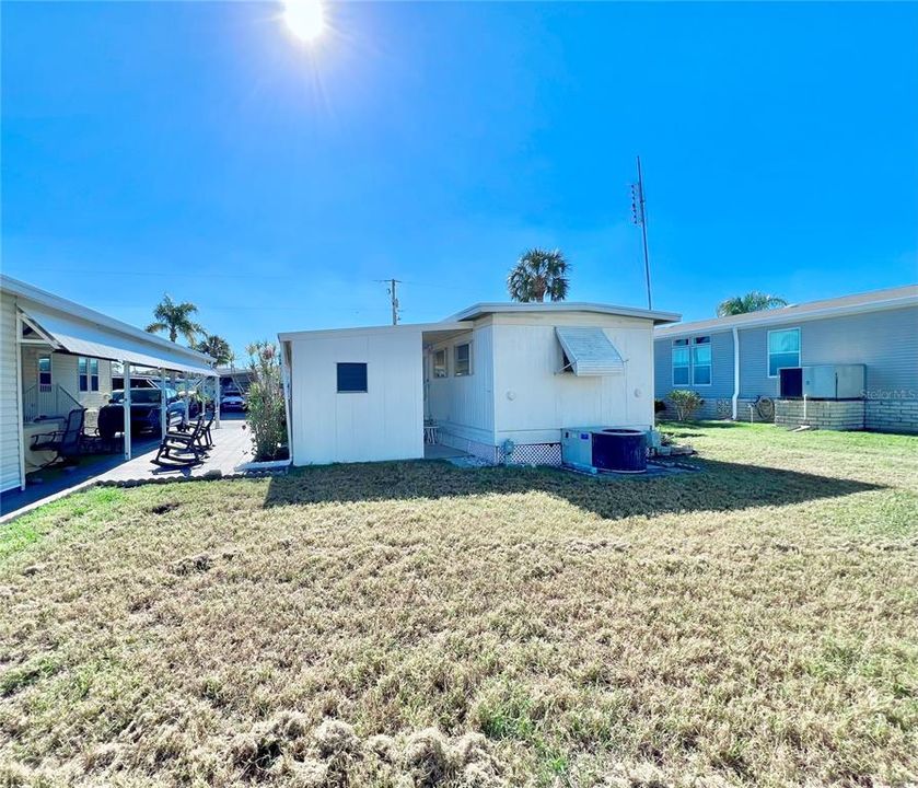 Backyard with plenty of room to expand or put a larger unit on the lot.